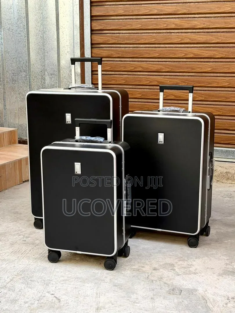 Hard-Shell Aluminum Trolley Suitcases Available as a Three-Piece Set.