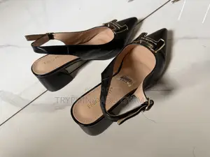 Brand New Classic Black Slicked Back Shoe for Ladies