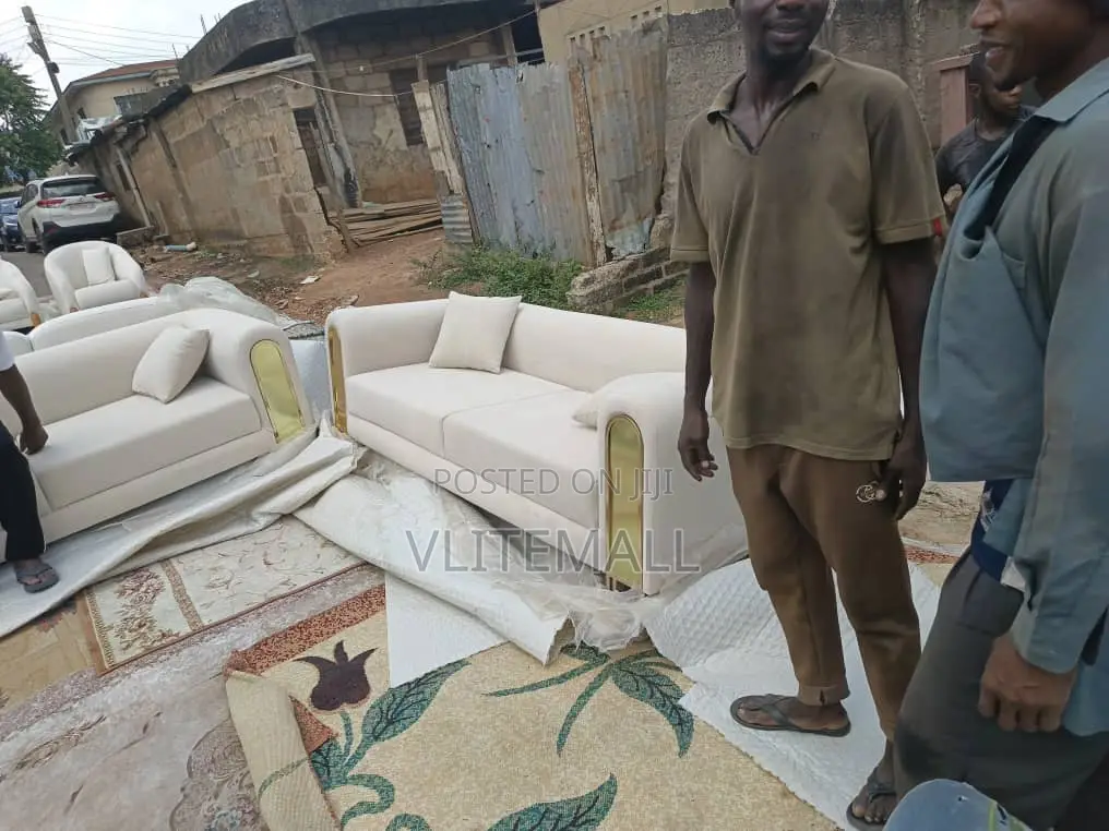 White Sofas With Gold-Colored Metal