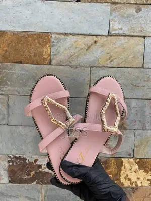Pink Faux Leather Slipper With Metallic Keyhole Design