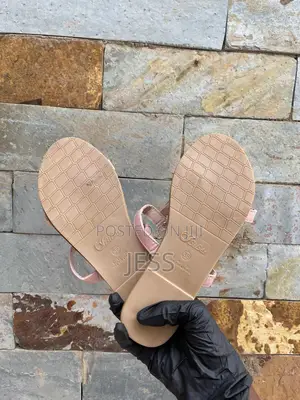 Pink Faux Leather Slipper With Metallic Keyhole Design