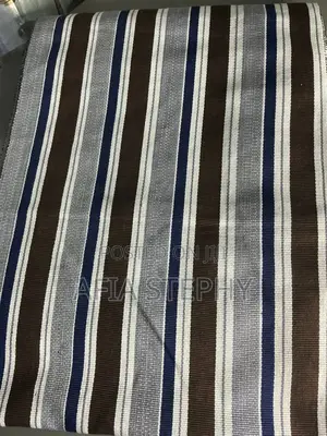 Brown, Blue-Black and White Mixed Kente Available .
