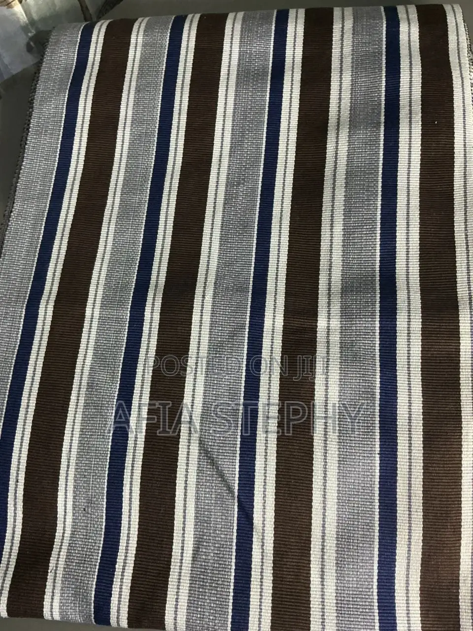 Brown, Blue-Black and White Mixed Kente Available .
