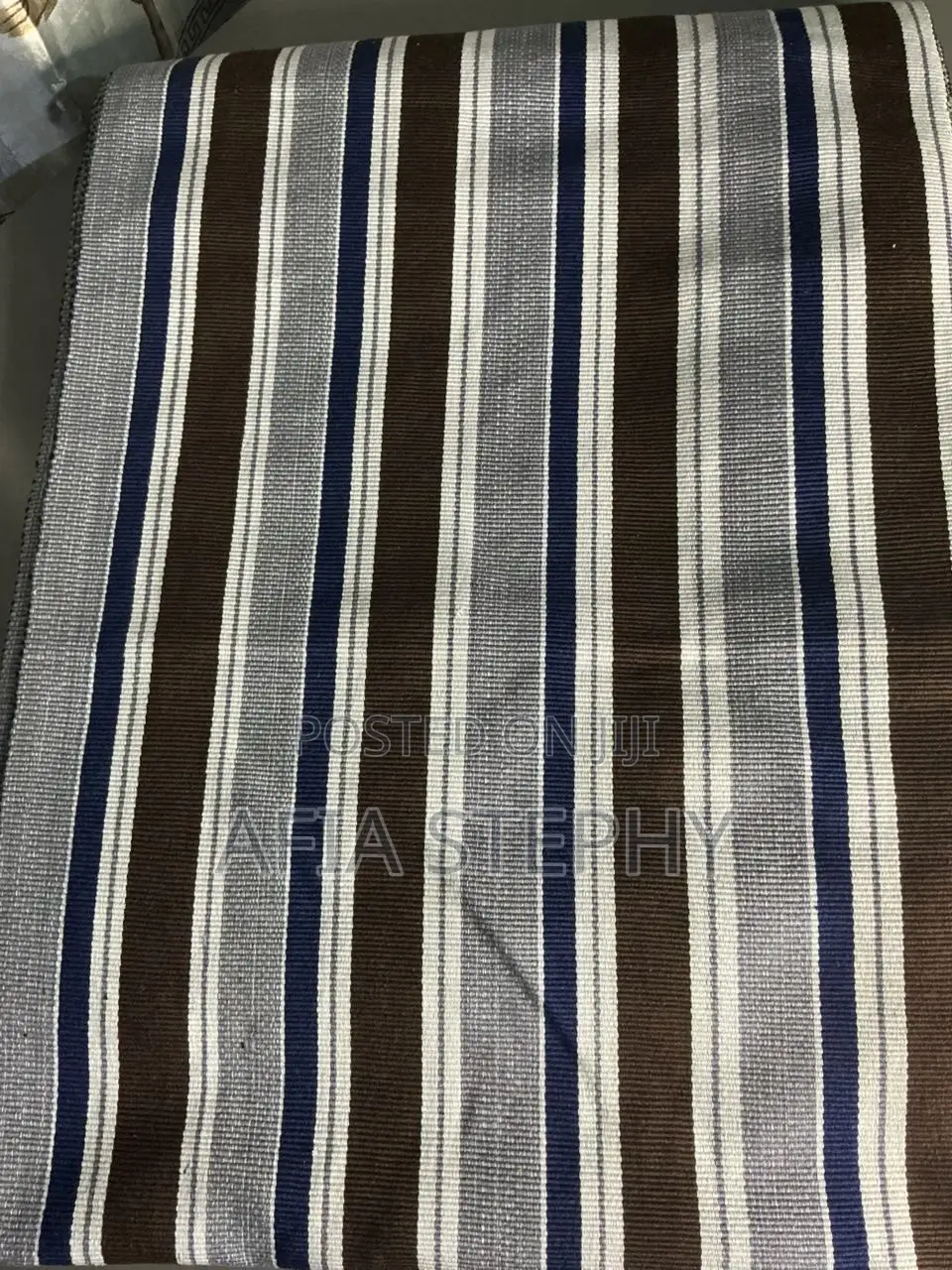 Brown, Blue-Black and White Mixed Kente Available .