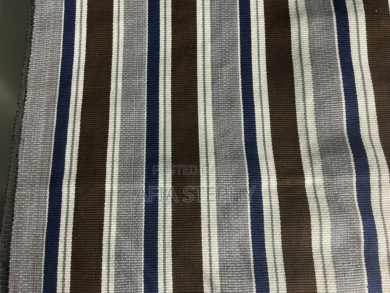 Brown, Blue-Black and White Mixed Kente Available .