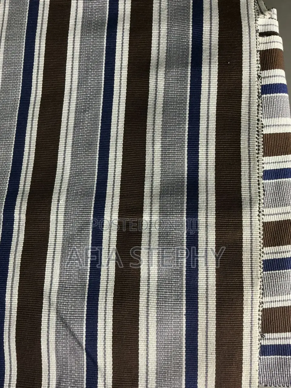 Brown, Blue-Black and White Mixed Kente Available .