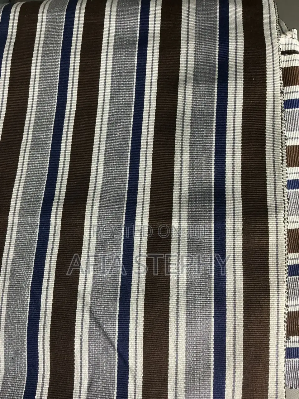 Brown, Blue-Black and White Mixed Kente Available .