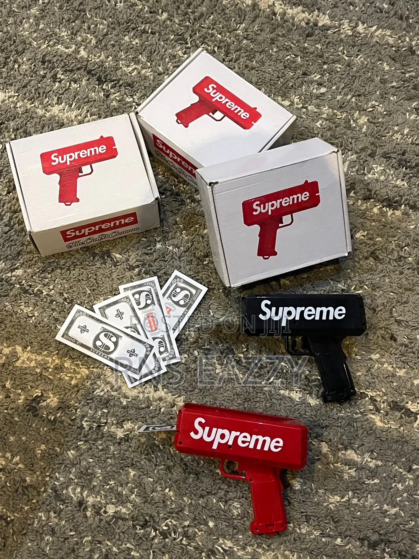 Supreme Black And Red Money Gun Available