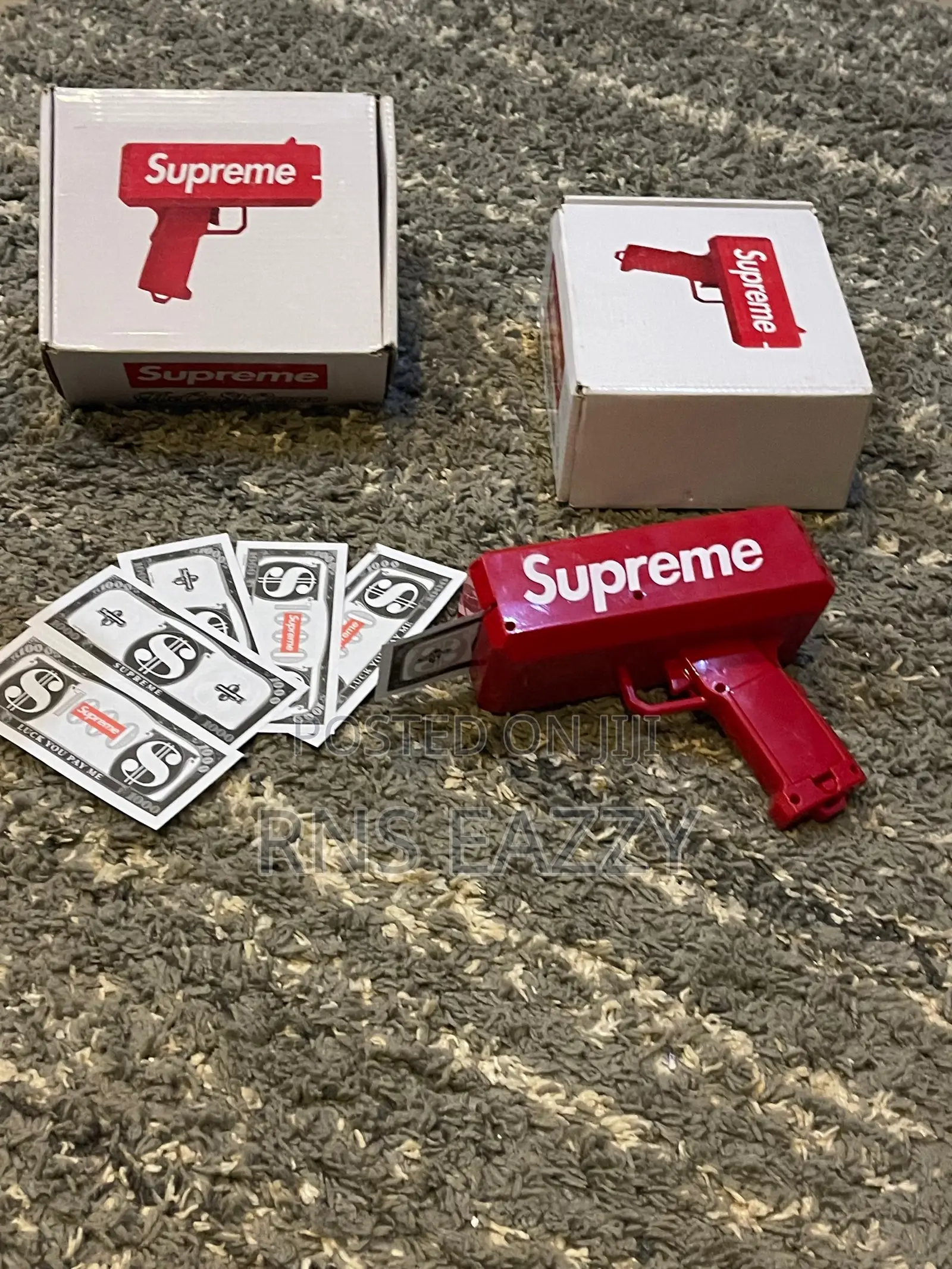 Supreme Black And Red Money Gun Available