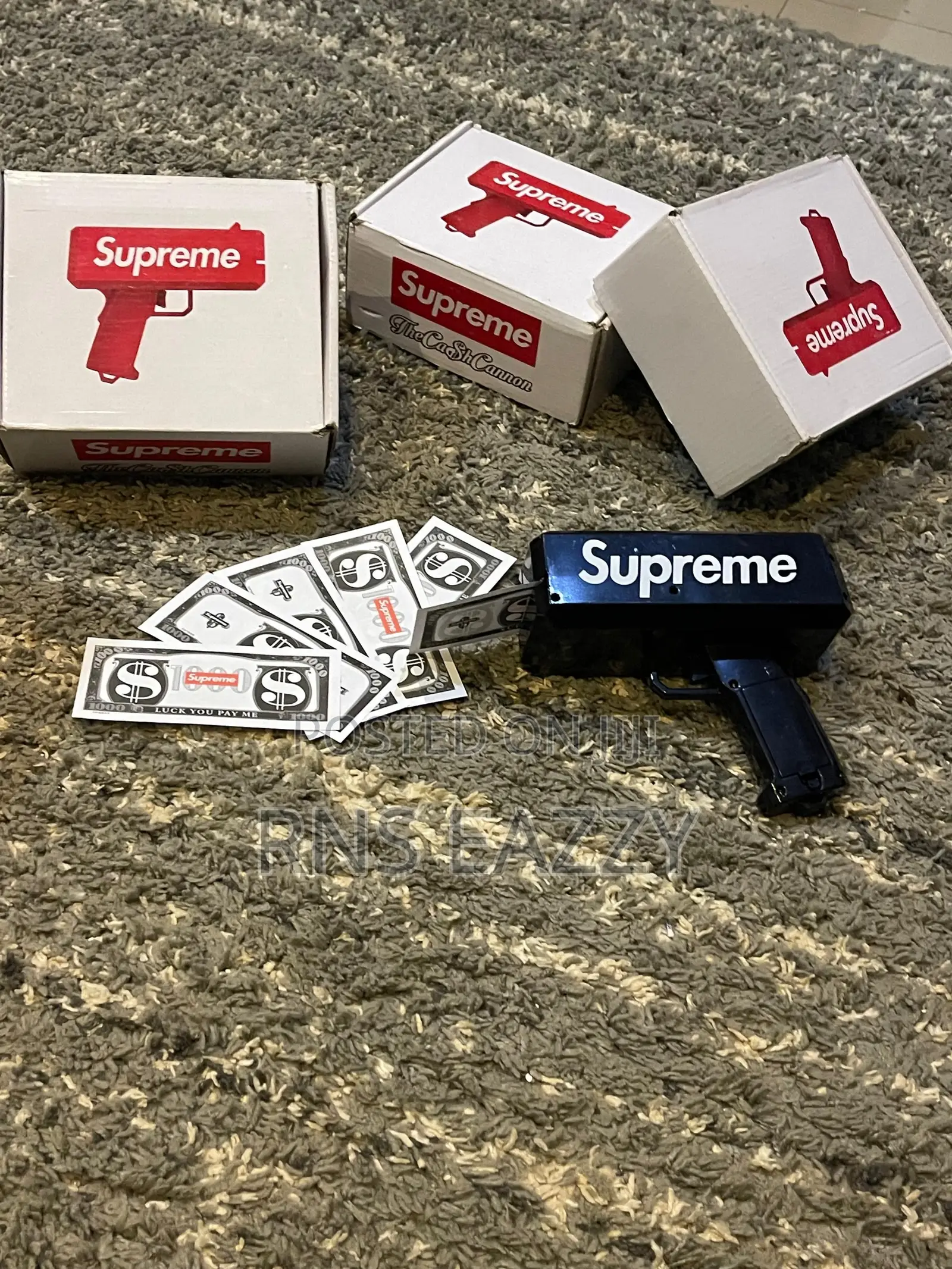 Supreme Black And Red Money Gun Available