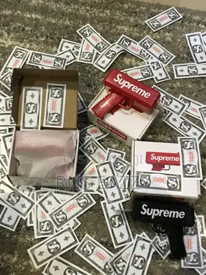 Supreme Black And Red Money Gun Available