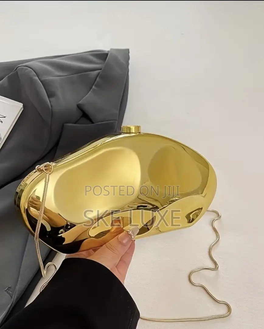 Luxury Metallic Gold Sculpted Clutch Bag