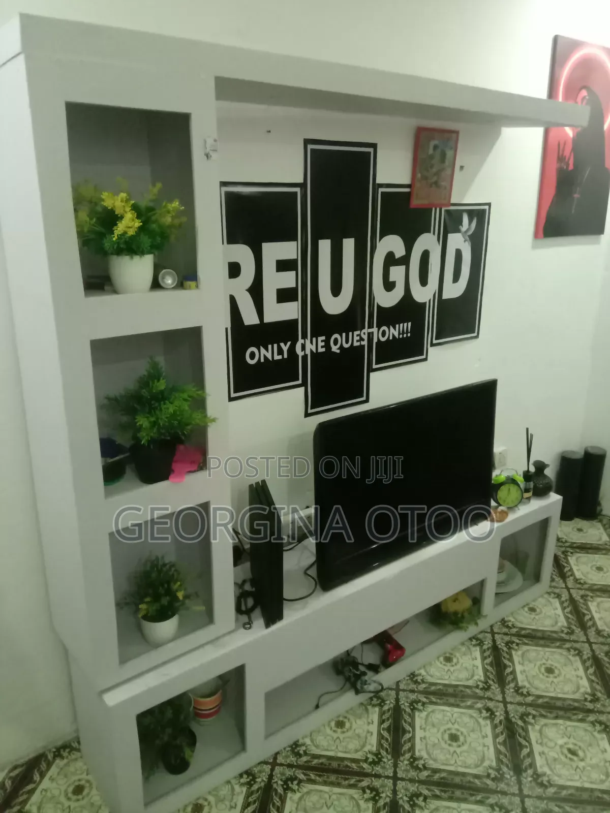 Tv Stand and Flowers Going for Cool Price