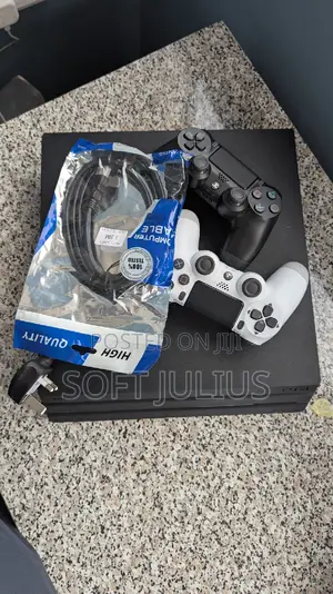 Sony Playstation 4 Pro With 2 Free Controllers and 17 Games