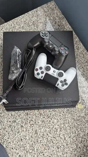 Sony Playstation 4 Pro With 2 Free Controllers and 17 Games