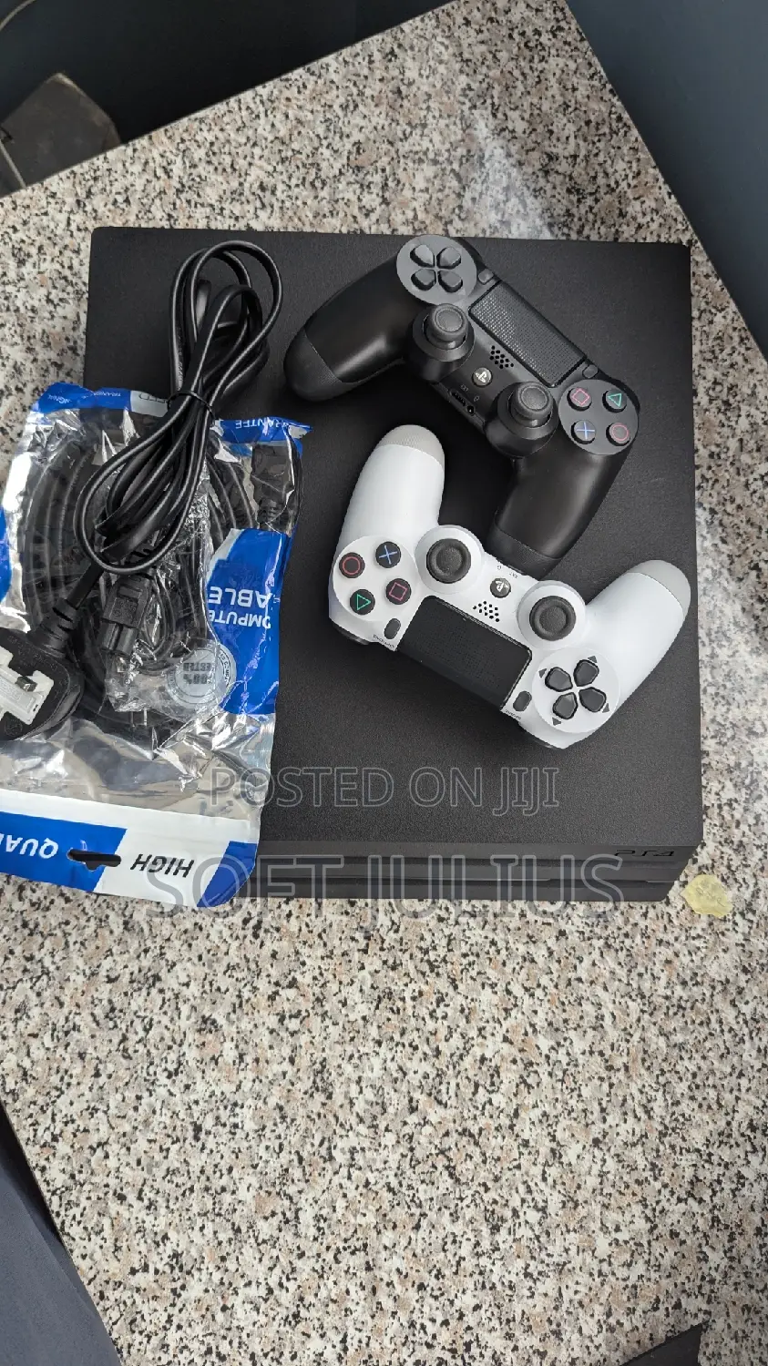 Sony Playstation 4 Pro With 2 Free Controllers and 17 Games