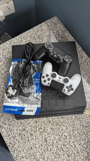 Sony Playstation 4 Pro With 2 Free Controllers and 17 Games