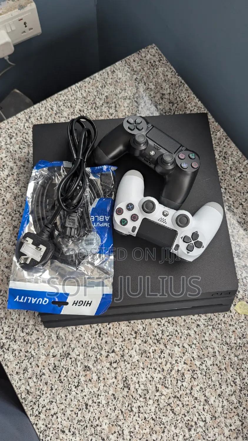 Sony Playstation 4 Pro With 2 Free Controllers and 17 Games
