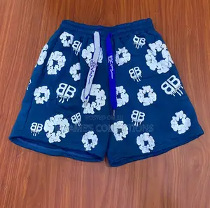 Denim Tears the Cotton Wreath Shorts.