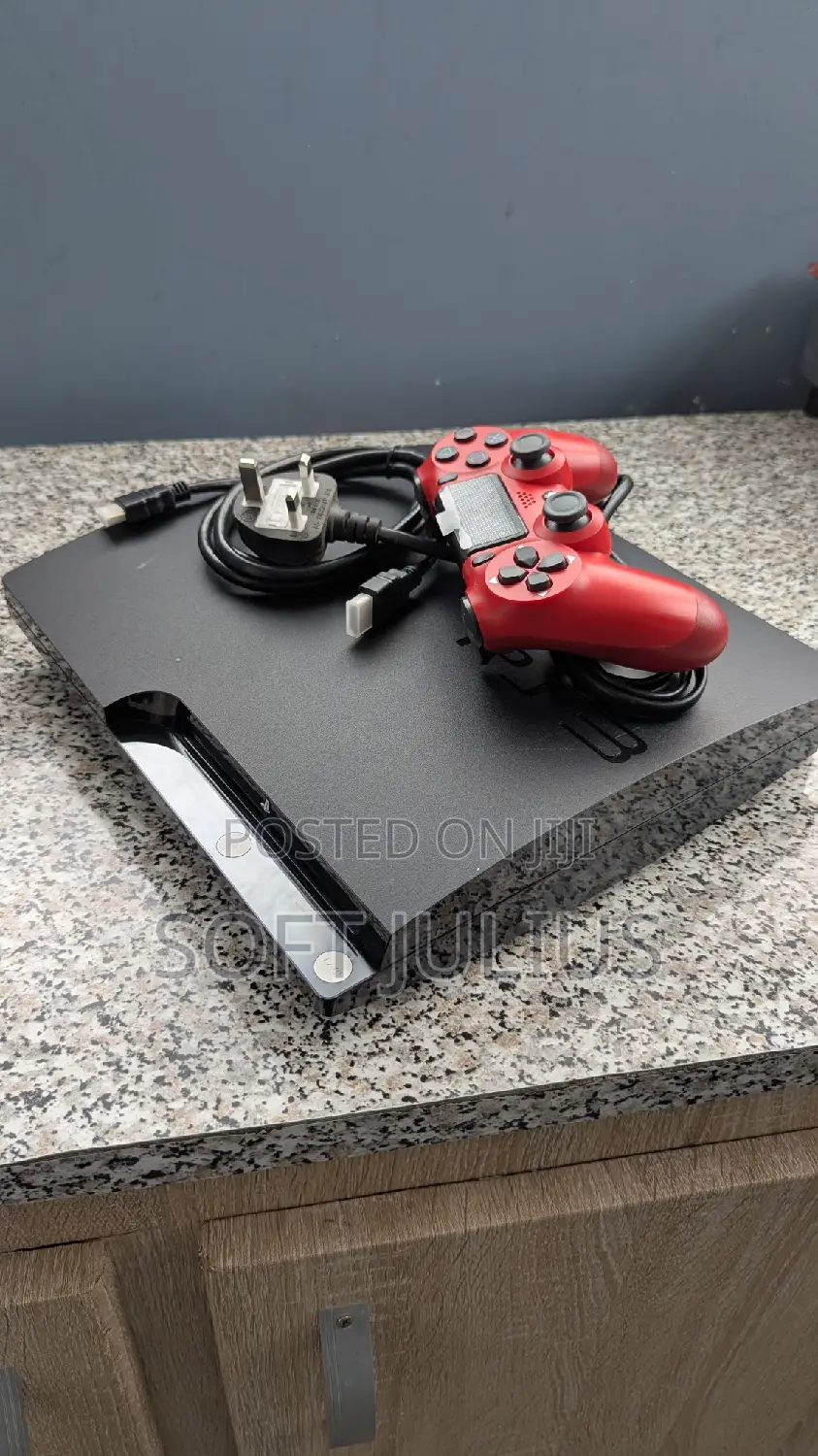 Black Ps3 With Red Ps4 Controller and Games Installed Ready for Sale