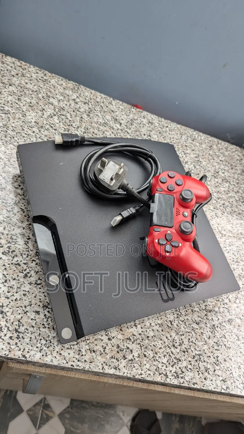 Black Ps3 With Red Ps4 Controller and Games Installed Ready for Sale