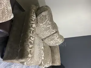 Uk Used Double Seater Sofa. Gold Color