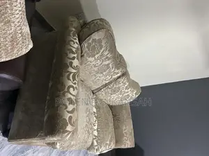 Uk Used Double Seater Sofa. Gold Color