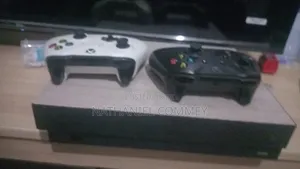 Xbox One X 1tb With One Controller Over 8 Games to Be Installed