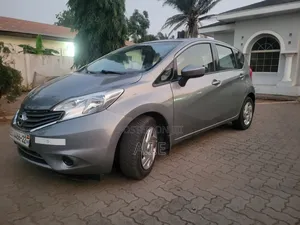 Nissan Versa 1.6 SV 4dr Sedan (1.6L 4cyl CVT) 2015 Gray