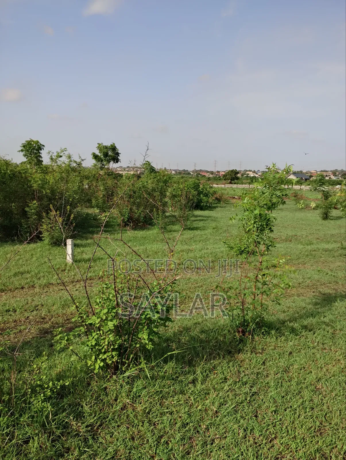 Over 400 Acres of Demarcated Lands Afienya Main Road Side for Sale