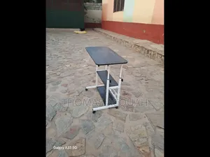 Adjustable Table With Shelves