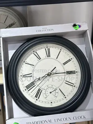 Home Collection Traditional Lincoln Wall Clock Featuring a Black Frame