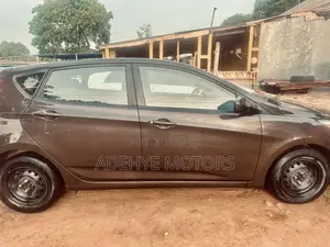Hyundai Accent GLS 4dr Sedan (1.6L 4cyl 6M) 2015 Brown