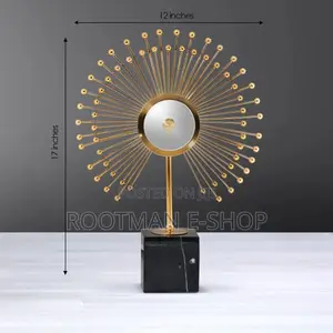 Golden Sunburst Table Sculpture With a Polished Finish