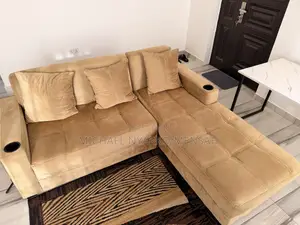 L-Shaped Sofa With Pillows