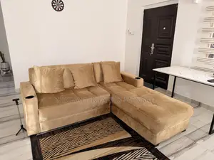 L-Shaped Sofa With Pillows