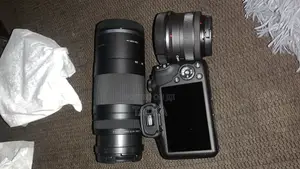 Canon Eos R100 Mirrorless Camera With 2 Lenses 18-45mm + 75-300mm