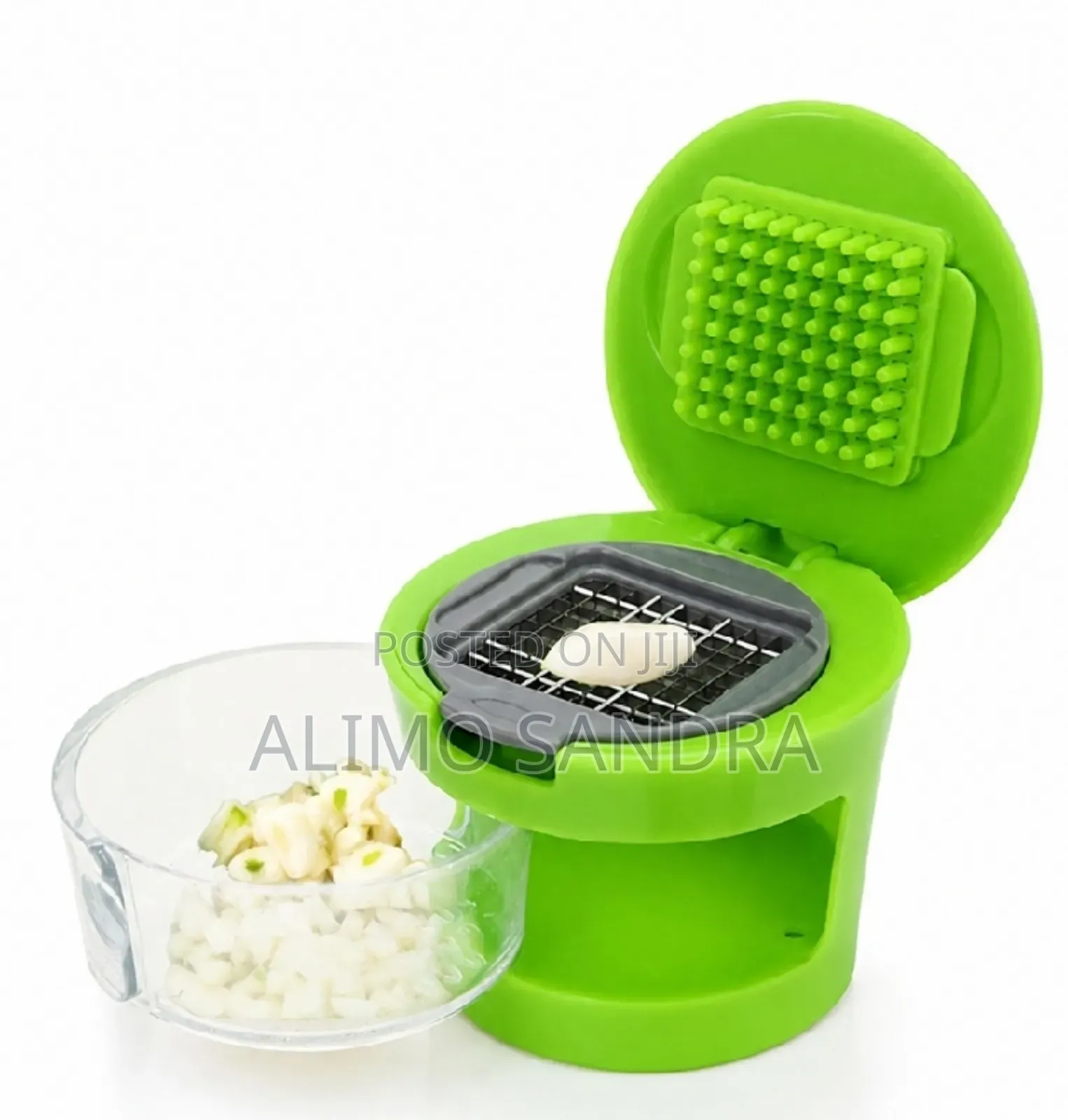 Multifunction Plastic Garlic Presser Crusher Slicer Storage Tool.