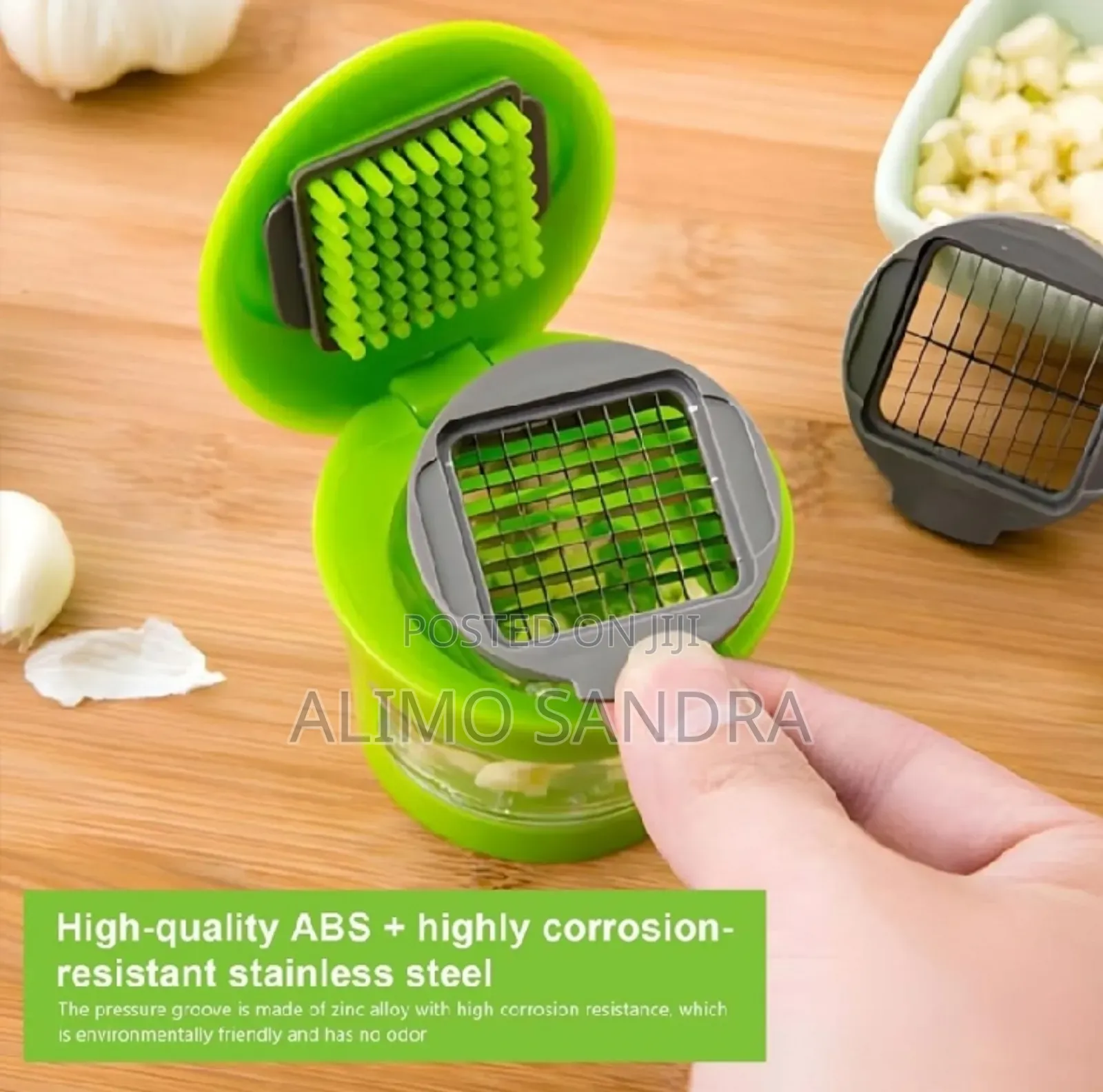 Multifunction Plastic Garlic Presser Crusher Slicer Storage Tool.