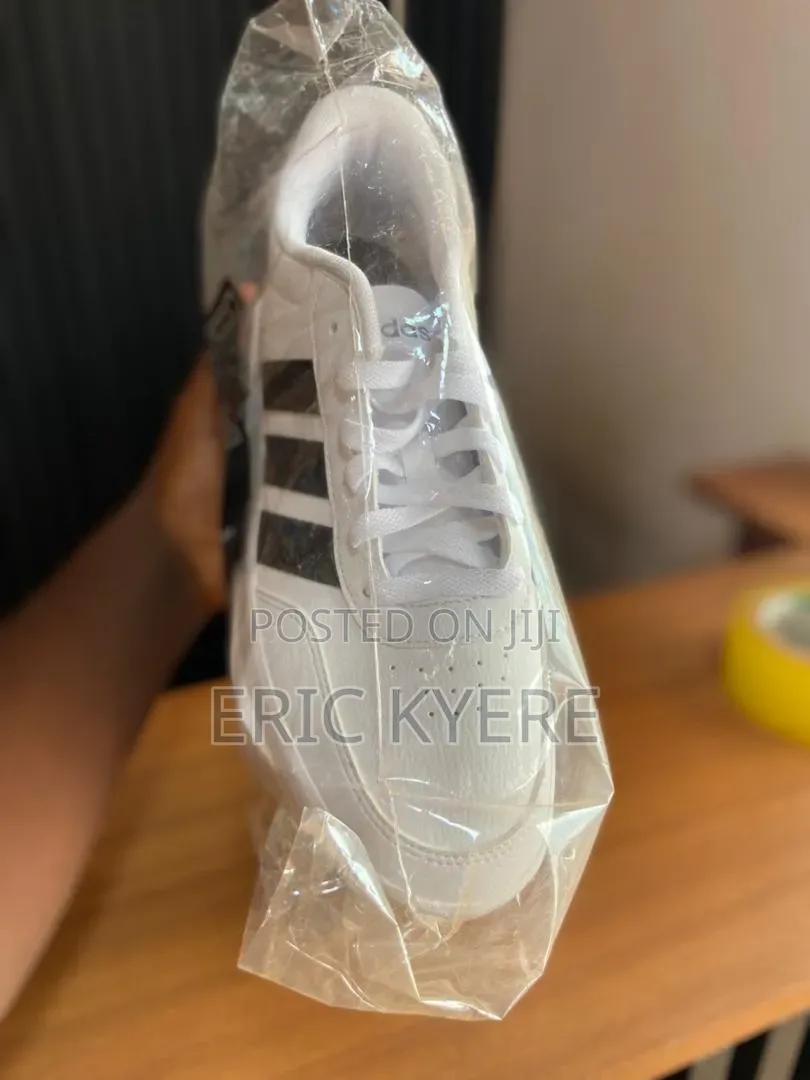 Adidas White Casual Sneakers With Black Stripes
