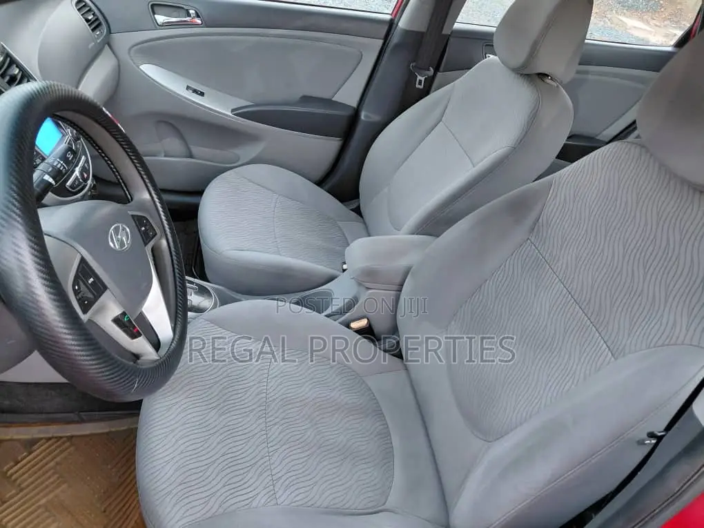Hyundai Accent SE 4dr Hatchback (1.6L 4cyl 6A) 2014 Red