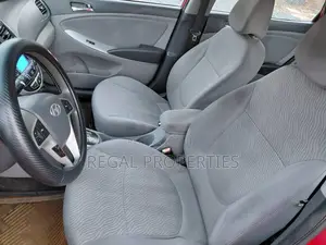 Hyundai Accent SE 4dr Hatchback (1.6L 4cyl 6A) 2014 Red