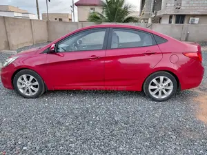 Hyundai Accent SE 4dr Hatchback (1.6L 4cyl 6A) 2014 Red