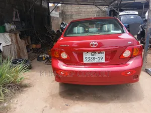 Toyota Corolla Base 4dr Sedan (1.8L 4cyl 5M) 2010 Red