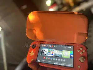 Nintendo Switch Lite 32 Gig +128 Gig With 9 Games