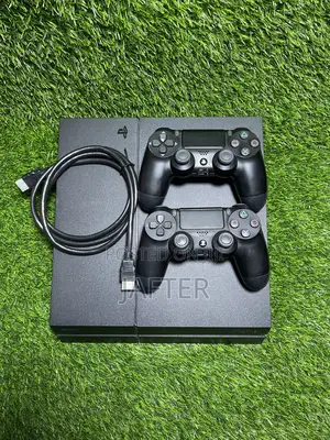 Sony Playstation 4 Standard Loaded With 10 Games