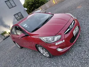 Hyundai Accent SE 4dr Hatchback (1.6L 4cyl 6A) 2014 Red