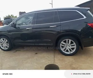 Honda Pilot Touring 4dr SUV 4WD (3.5L 6cyl 9A) 2016 Black