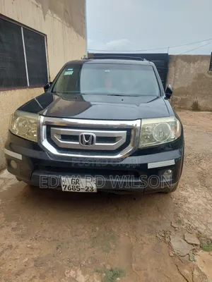 Honda Pilot Touring w/RES/Navi 4WD (3.5L 6cyl 5A) 2010 Black