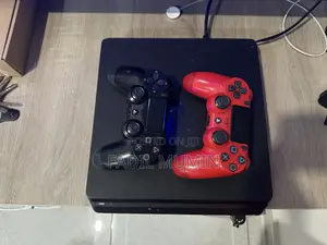 Ps4 Slim With Two Controllers and Three Games 2. Negotiable